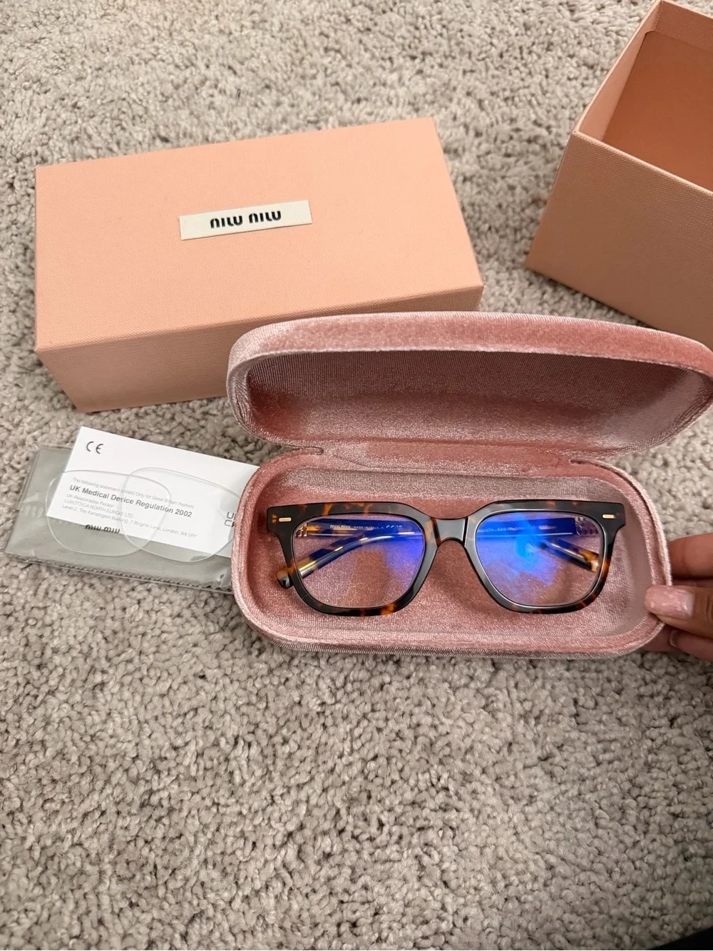 Miu Miu Tortoiseshell Frame Glasses with Gold Accents